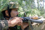 An Indian soldier keeps vigil at the Indo-Pak border. Photo: Reuters