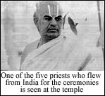 One of the five priests who flew from India for the ceremonies is seen at the temple