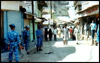 RAF jawans keep vigil at Ansari Chowk, which divides the Hindu conclave from the Muslim one