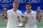 Todd Woodbridge and Jonas Bjorkman with their trophy