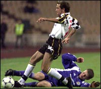 Martelinho (L) of Portugal's Boavista fights for the ball with Oleksandr Melashchenko (R) of Ukraine's Dynamo Kiev 